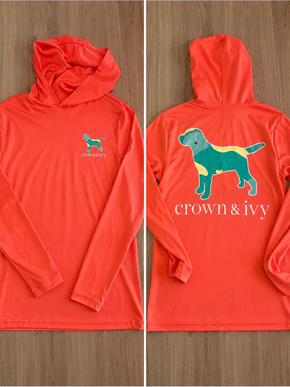 Crown & Ivy coral/orange performance hoodie with dog golf graphic